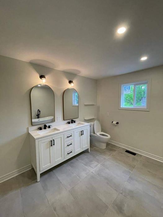 After: Ensuite: tile going in to finished