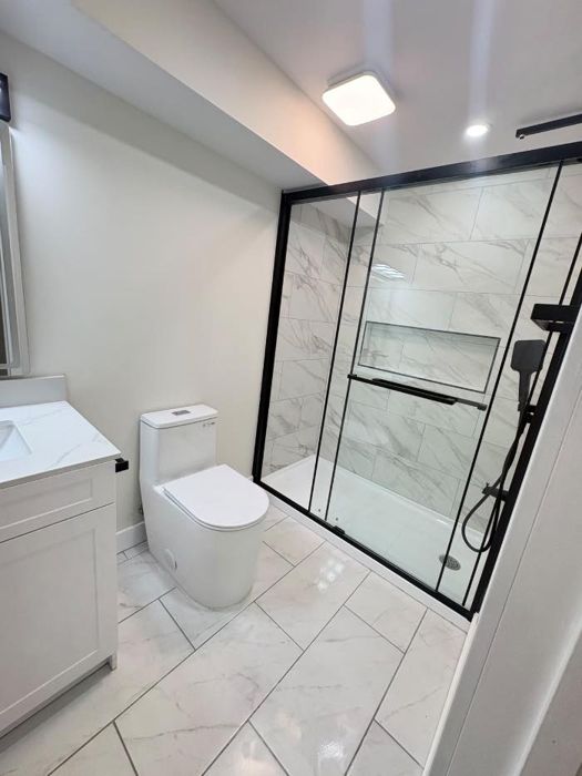 Bathroom - shower & floating toilet